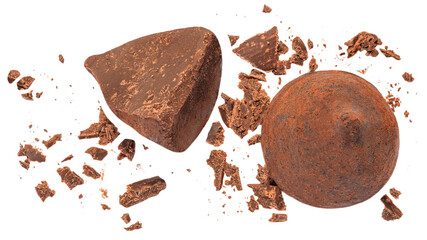 Chocolate truffles candies covered with cocoa isolated on white background. Truffle whole and bitten pieces top view