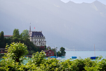 Beautiful swiss landscape. Iseltwald vilage on Brienzersee lake.
