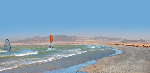 Windsurfer Surfing The Wind - The Namib desert along side the Atlantic ocean coast of Namibia, Southern Africa © muratart