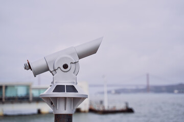 Coin Operated Spyglass viewer next to the waterside promenade looking out to the bay.
