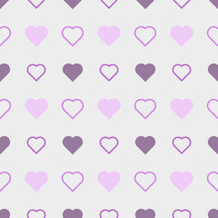 Seamless pattern with purple and pink hearts on a purple background. Can be used for printing