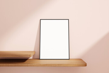 Minimalist and clean vertical black poster or photo frame mockup on the wooden table leaning against the room wall