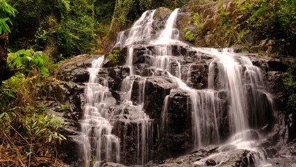 Long exposure Sa Lad Dai Waterfall located in Ban Na District, Nakhon Nayok, Thailand.