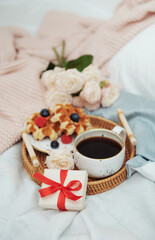 Fototapeta na wymiar Romantic breakfast in bed