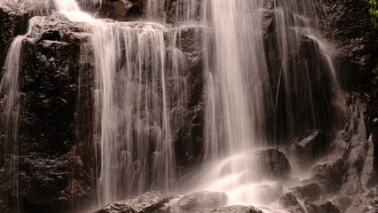 Naklejka na ściany i meble Long exposure Sa Lad Dai Waterfall located in Ban Na District, Nakhon Nayok, Thailand.