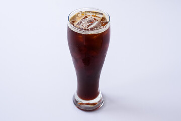 iced black coffee glass on white background.