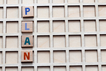 Plan the word arranged with wooden letters.