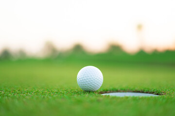 Golf sport played on the outdoor courts of the social elite.