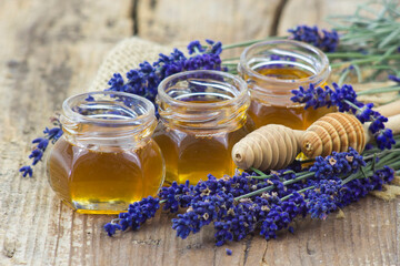 honey and lavender on wooden background