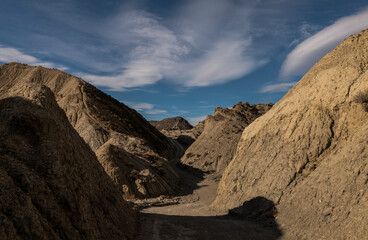 Landscape of Tabernas Desert, Almeria, Spain, against cloudy sky