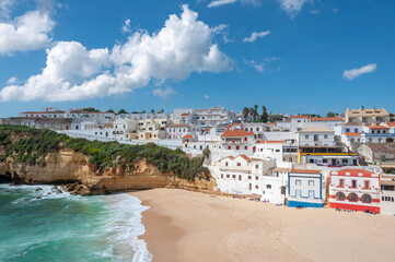 Townscape of Carvoeiro in the Algarve with beach and rocky coastline