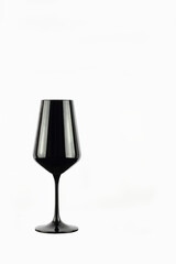 Black vine glass on white, empty drink container