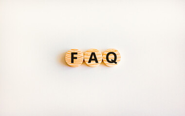 FAQ frequently asked questions symbol. Concept words FAQ frequently asked questions on wooden...
