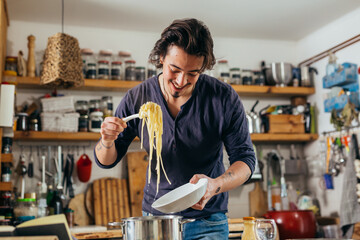 man preparing food in his kitchen