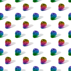 Seamless pattern with colorful sculls on white background. It can be used for gift wrapping paper, cloth, fabric or web design.