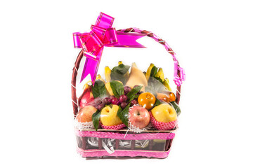 Fresh fruit in the basket on a white background. - 482388132