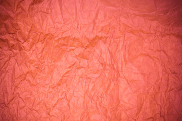 Red crumpled paper texture.