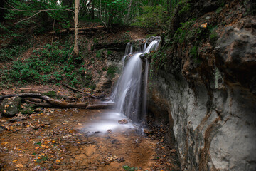 Fototapeta na wymiar Small waterfall dauda in Gauja national park,Latvia