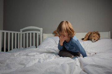 The child hit while playing on the bed of the parents. Baby was injured after being hit. Child...