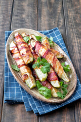 Grilled zucchini fries wrapped with a bacon