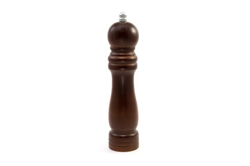 Pepper mill isolated. Dark wooden pepper mill isolated on white background.