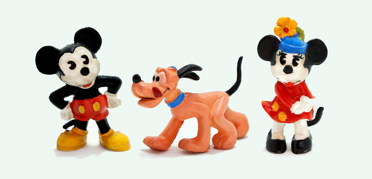  Mickey Mouse, Minnie and Pluto retro toys figures. Plastic doll. Vintage. Isolated. Cartoon character from Walt Disney Pictures Studios. Mickey is Minnie Mouse's boyfriend.  Classic Mickey.  Dog.