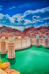 Modern Energetics Concepts. Hoover Dam and Penstock Towers in Lake Mead of the Colorado River on Border of Arizona and Nevada