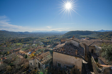 View of rooftops of Alatri from Acropolis and rays of sun, Fronzinone, Italy