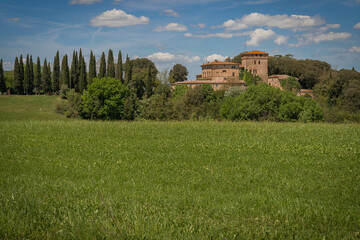 Fototapeta na wymiar Traditional view of spring fields in Tuscany, Italy