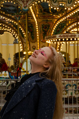 Woman at the carousel