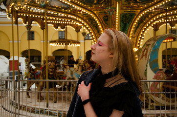 Woman at the carousel
