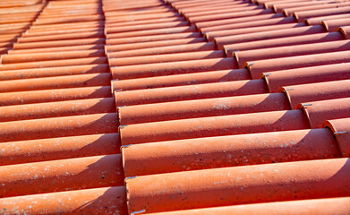 Close up of terracotta tiled roofs in Algarve, Portugal.

