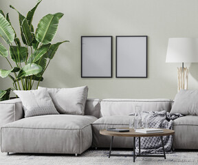 poster frames mock up in modern room with gray sofa and coffee table and tropical plant, 3d rendering