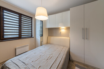 New modern bedroom. New home. Interior photography.
