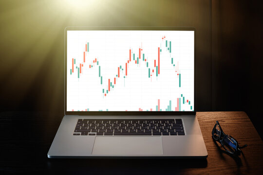 Analysis of financial charts of the stock market. Trader trading on stock quotes
