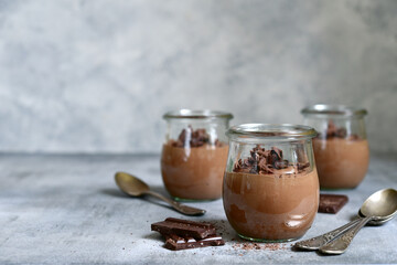 Delicious chocolate mousse in a vintage glasse jar.