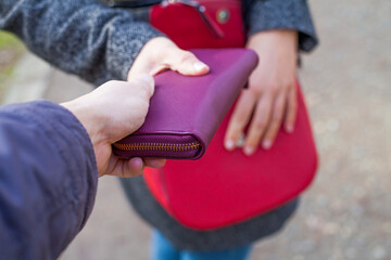 Close up pickpocketing outdoor