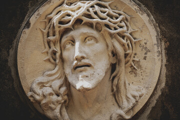 Retro styled statue of Jesus Christ in a crown of thorns