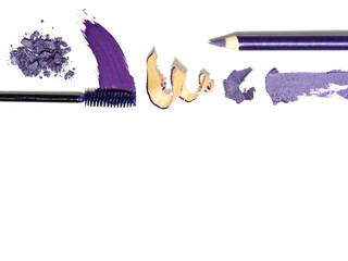 Purple make up samples and tools background.