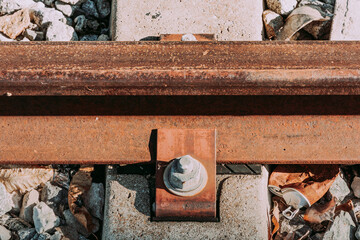 Close-up of a railway rail and sleeper.