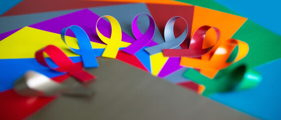 World cancer day background. Colorful ribbons, cancer awareness. multi-colored surface. International Agency for Research on Cancer
