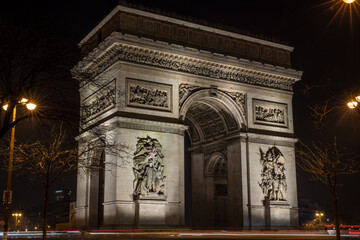 Fototapeta na wymiar Arch of Triumph (Arc de Triomphe) at night.