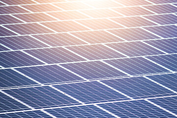 Focus on front a arranged solar photovoltaic panels. Renewable energy