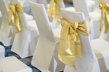 white elegance luxury wooden chairs  in wedding ceremony