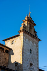 Fototapeta na wymiar Bergamo upper town, close-up of the medieval Tower called Torre della Campanella (tower of the small bell) or Torre della Cittadella, Lombardy, Italy, Europe.