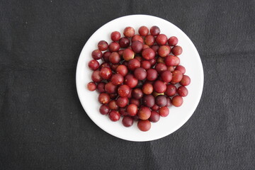 Ripe Camu camu fruits (Myrciaria dubia), Myrtaceae family. Location:  Maués – Amazon, Brazil.