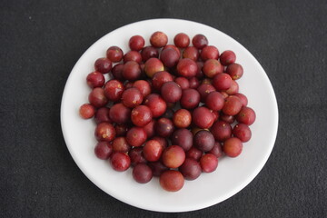 Ripe Camu camu fruits (Myrciaria dubia), Myrtaceae family. Location:  Maués – Amazon, Brazil.