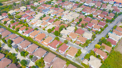 Aerial view of residential neighborhood. Urban housing development from above. Top view. Real estate in urban city town. Property real estate.