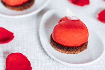 Valentine's day Heart shaped chocolate and strawberry cake. Celebration of love concept.