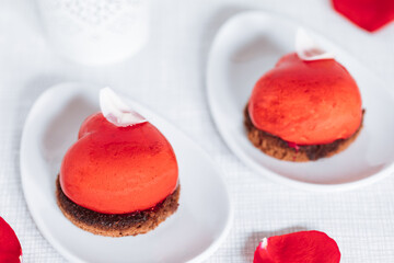 Valentine's day Heart shaped chocolate and strawberry cake. Celebration of love concept.